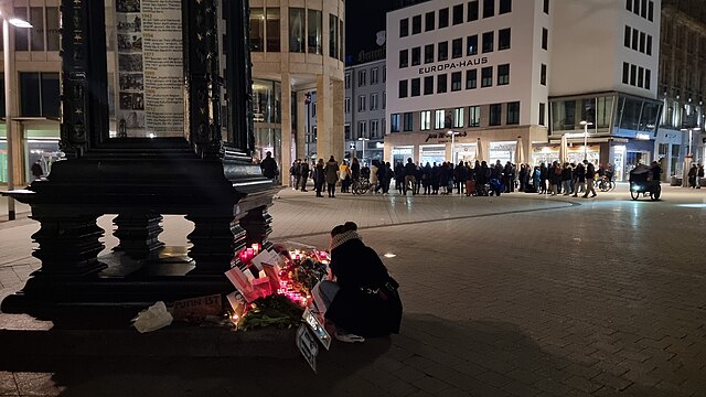 Candles and flowers left in remembrance of Alexey Navalny's Death