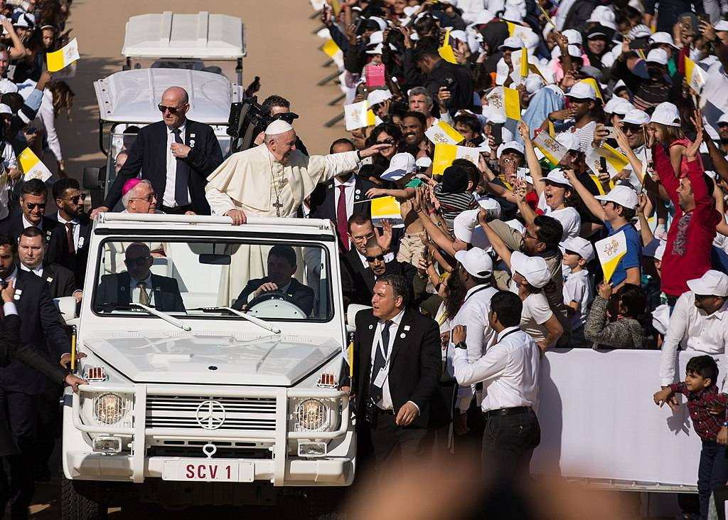 Pope Francis driving through the crowds in Abu Dhabi, Zayed Sports City.