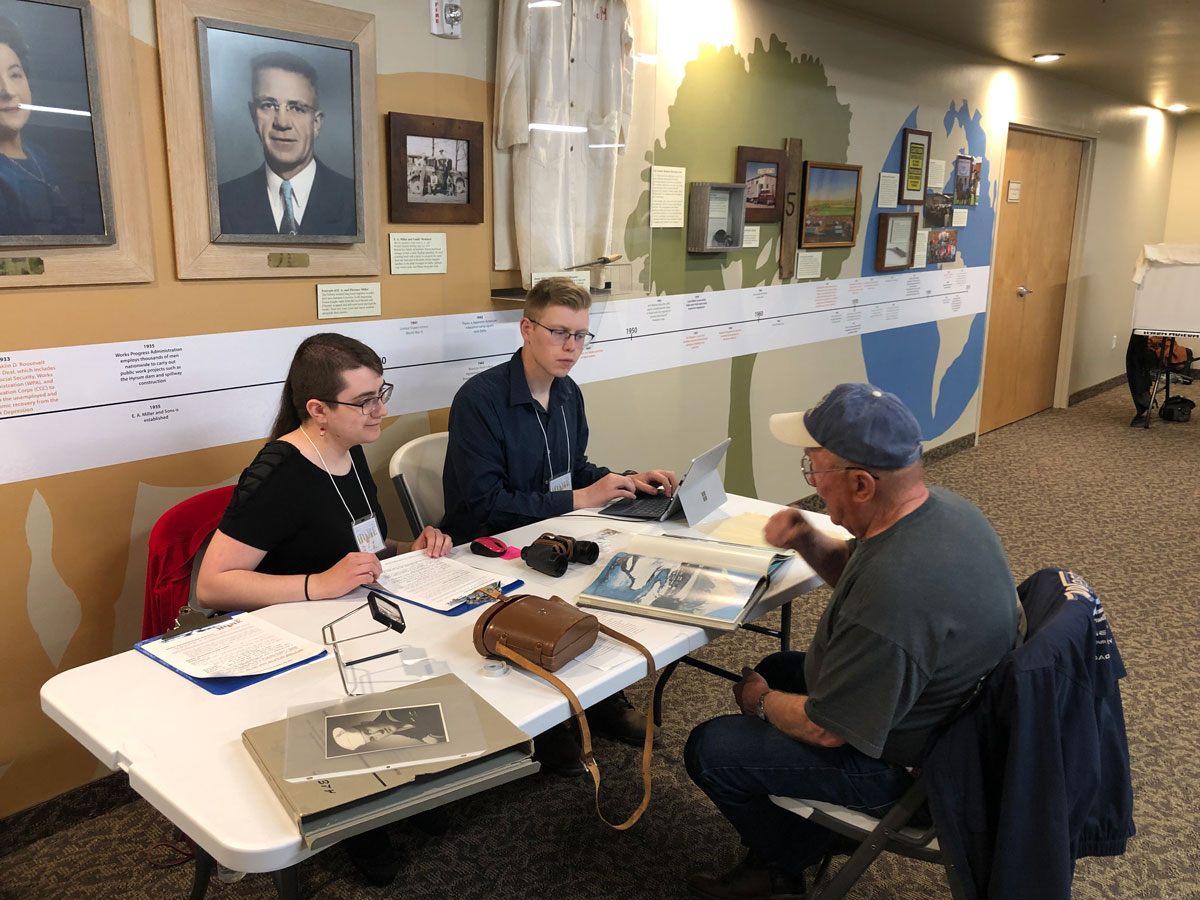 USU students document Cold War era objects at the Hyrum City Museum Bringing War Home Roadshow event on April 9, 2022.