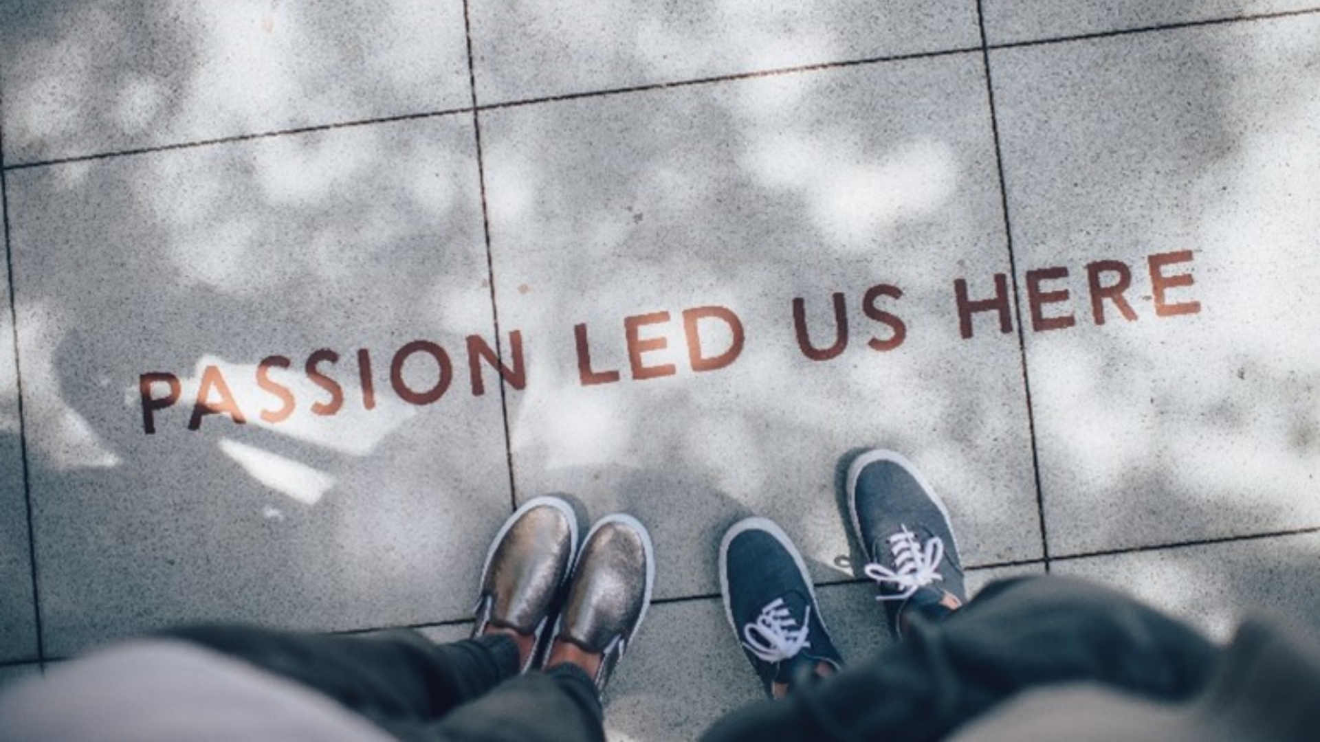 "passion led us here" is written on the ground